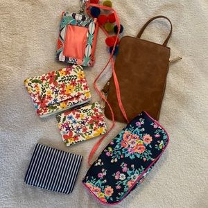 Assortment of mini wallets and zip bags